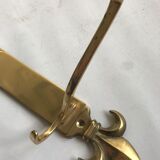 Golden brass wall rack