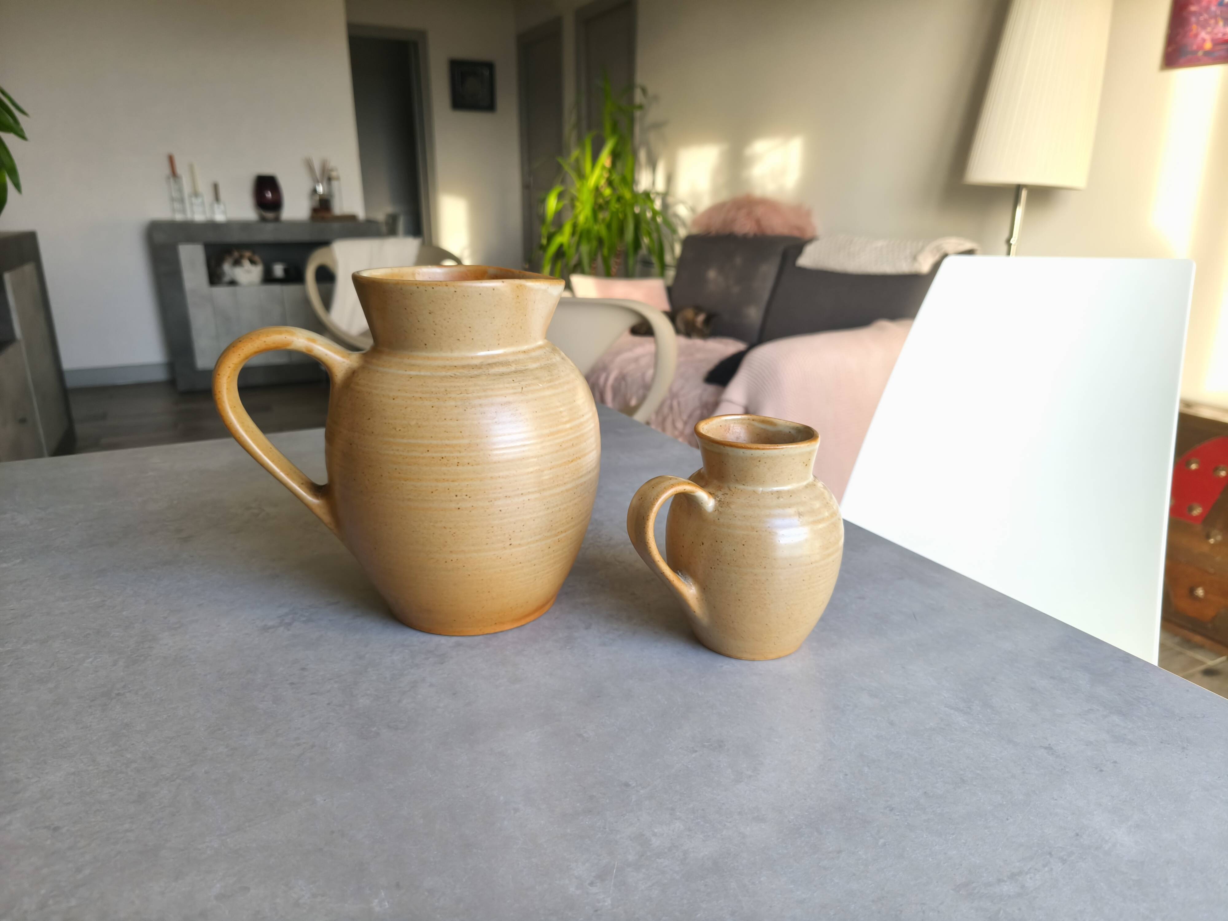 Set of two Village de France stoneware pitchers