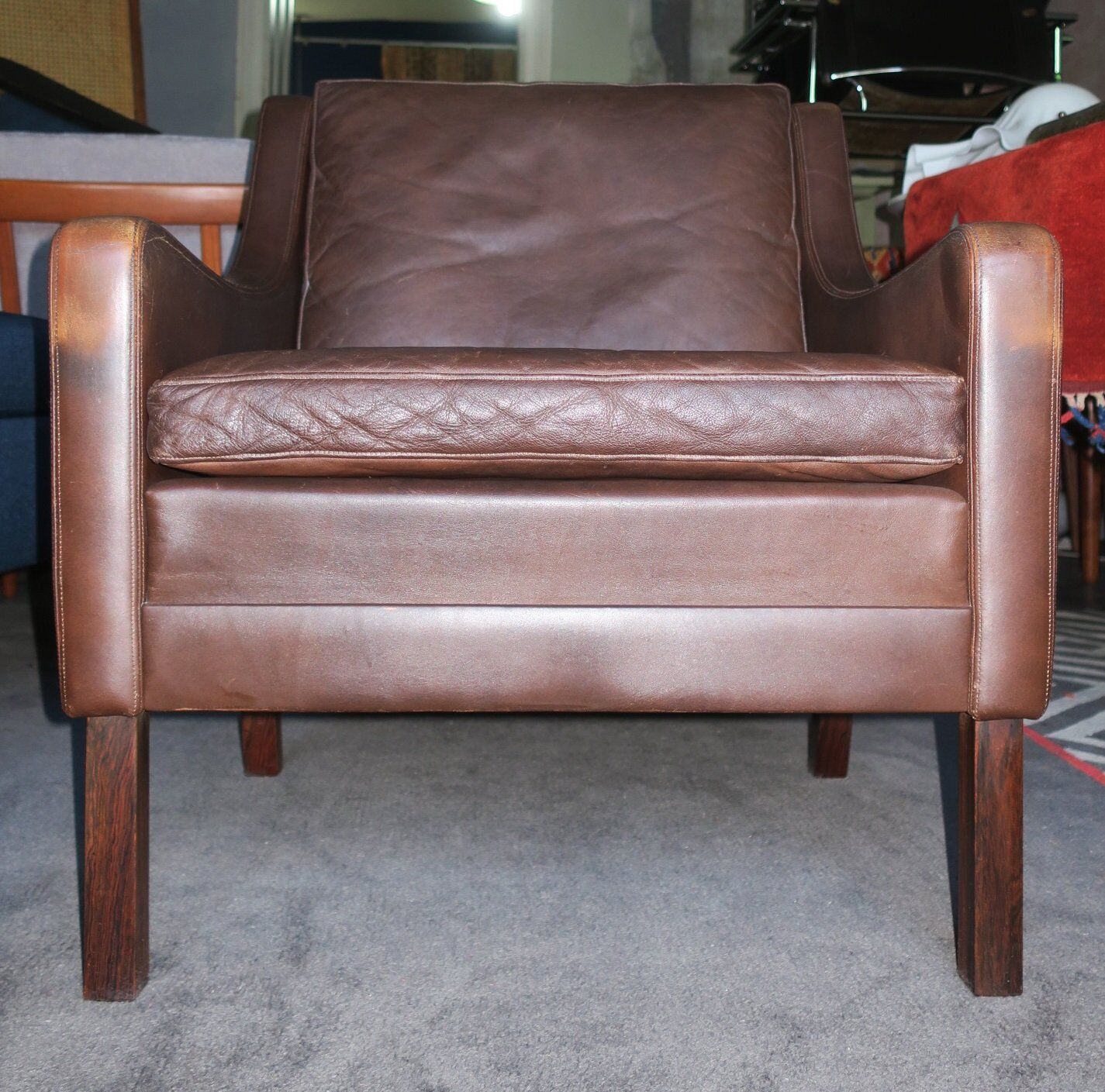 Fauteuil en cuir et bois de rose, années 1960