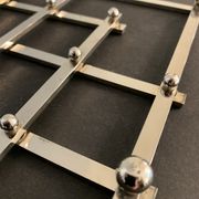 Paire de dessous de plat anciens extensibles métal argenté 1940