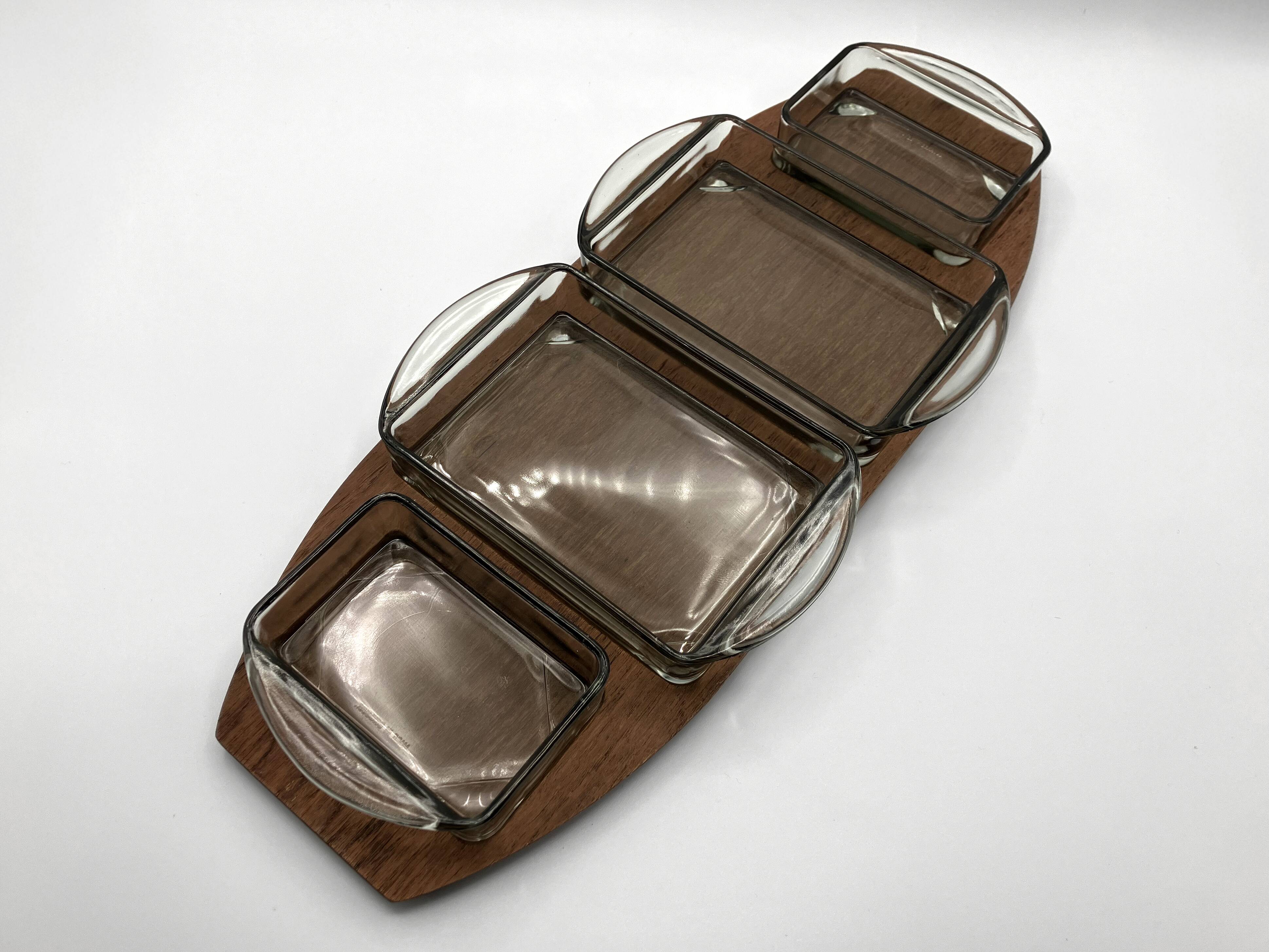 Teak tray and its 4 stackable glass dishes • Denmark • 1960