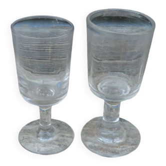 Set of 2 small glasses with old feet for digestive