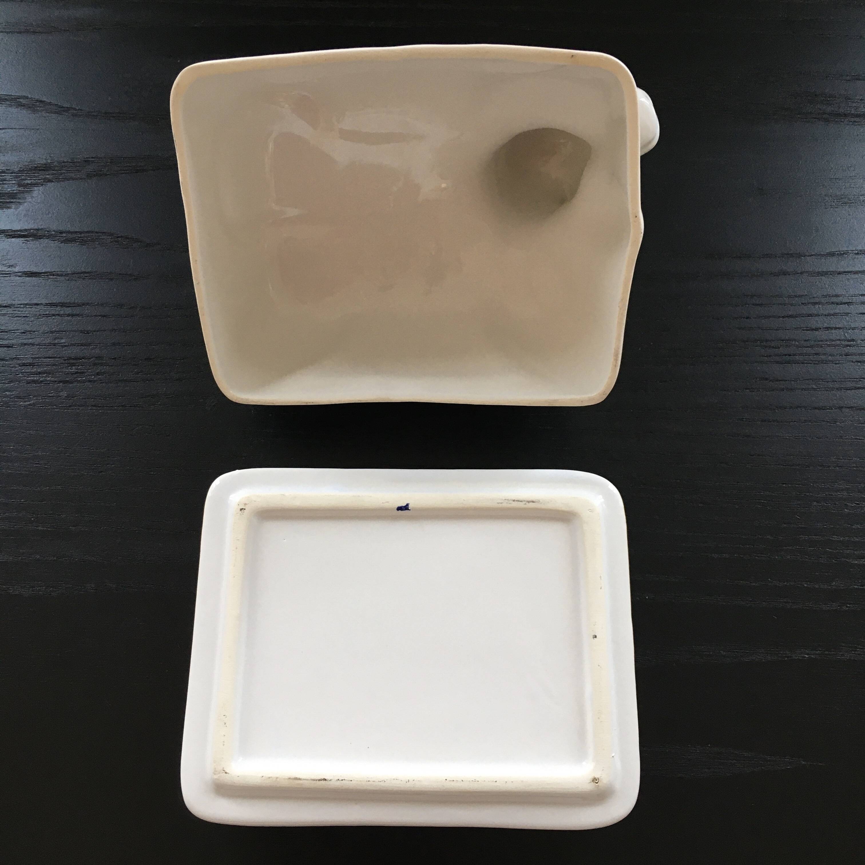 Porcelain cow butter dish