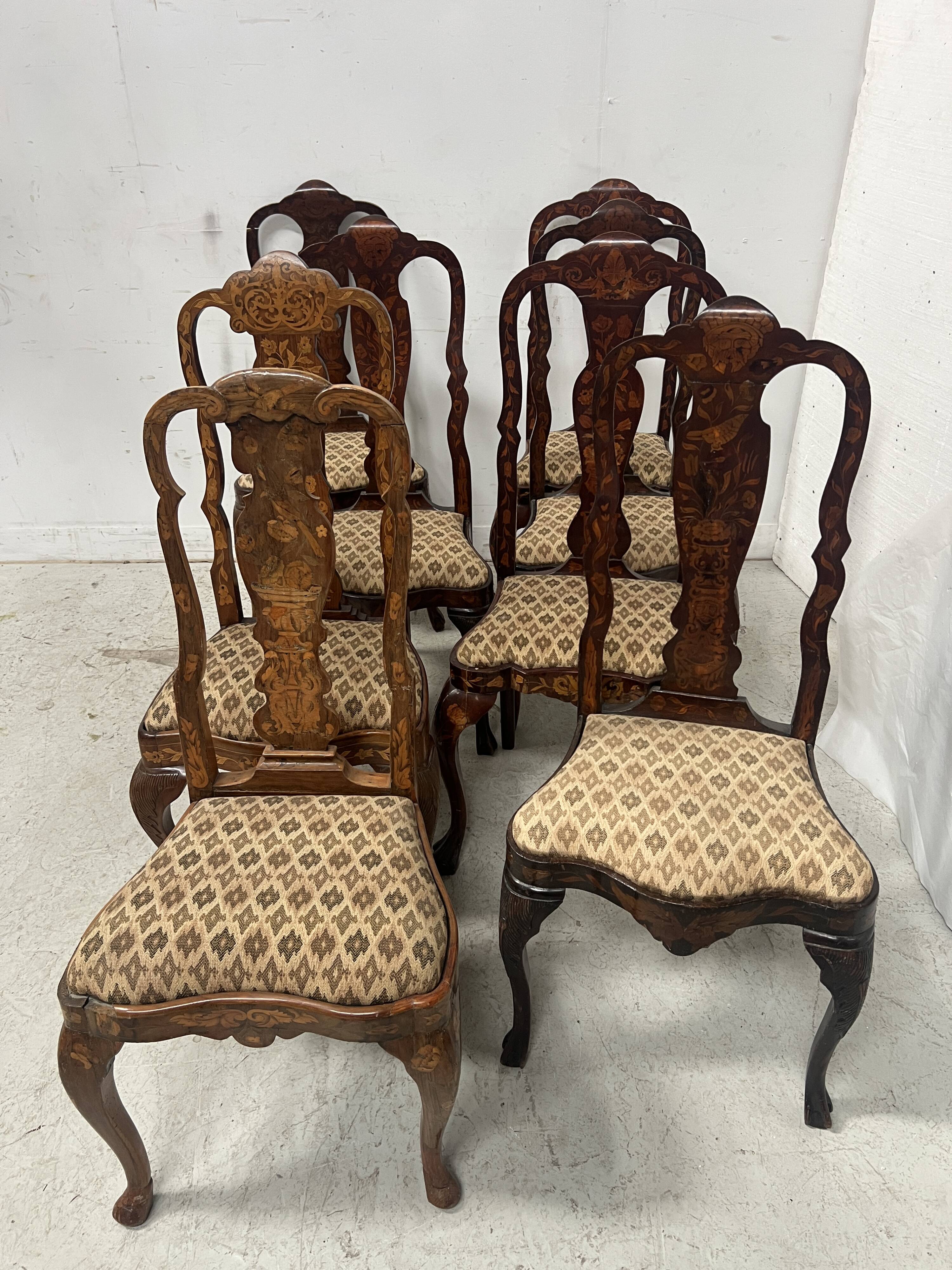 Set of eight Dutch marquetry chairs from the 19th century.
