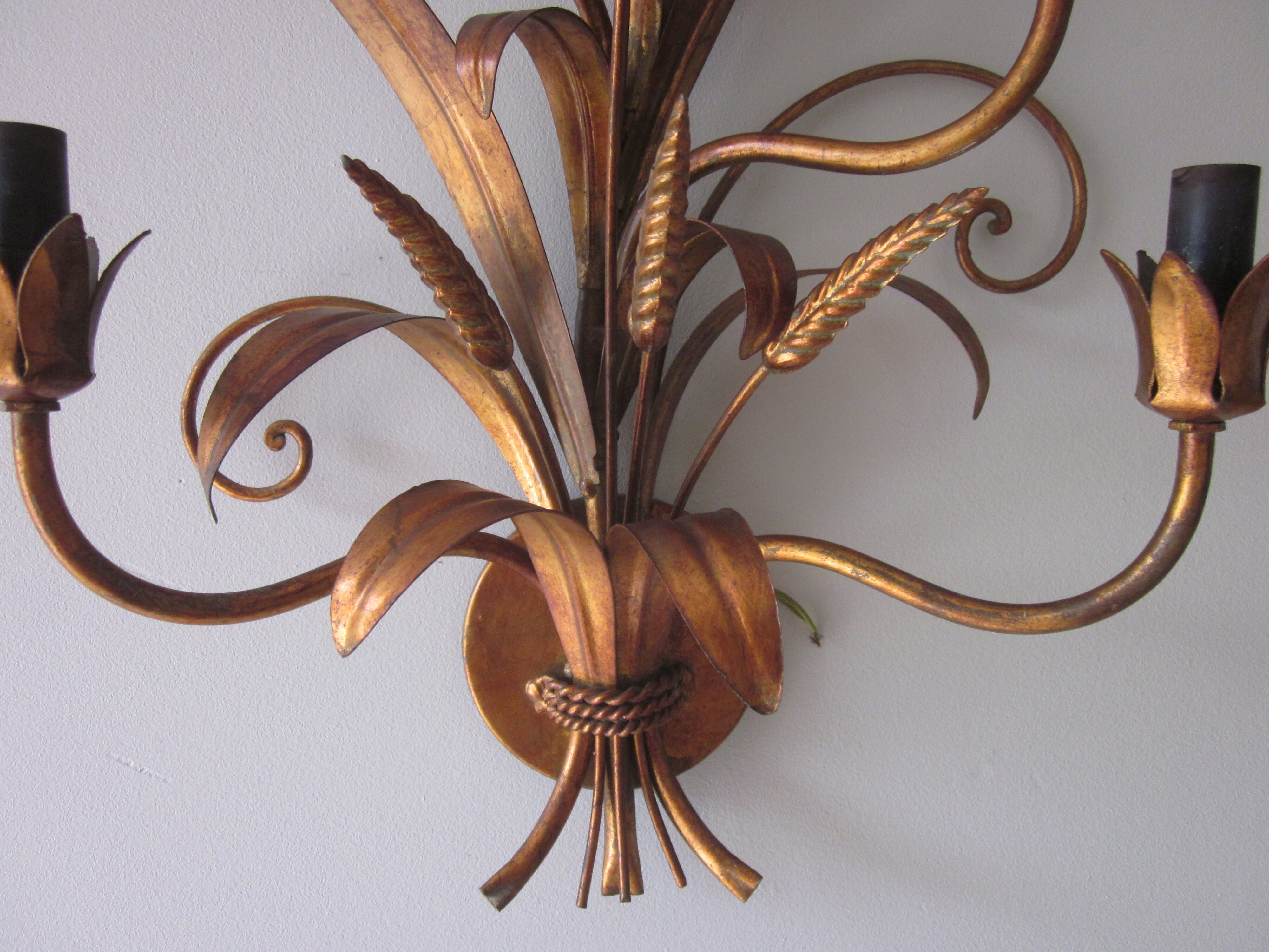 Sconce in gilded metal