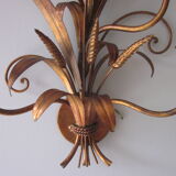 Sconce in gilded metal