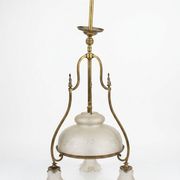 Antique brass chandelier with 3 lights and frosted glass shades.