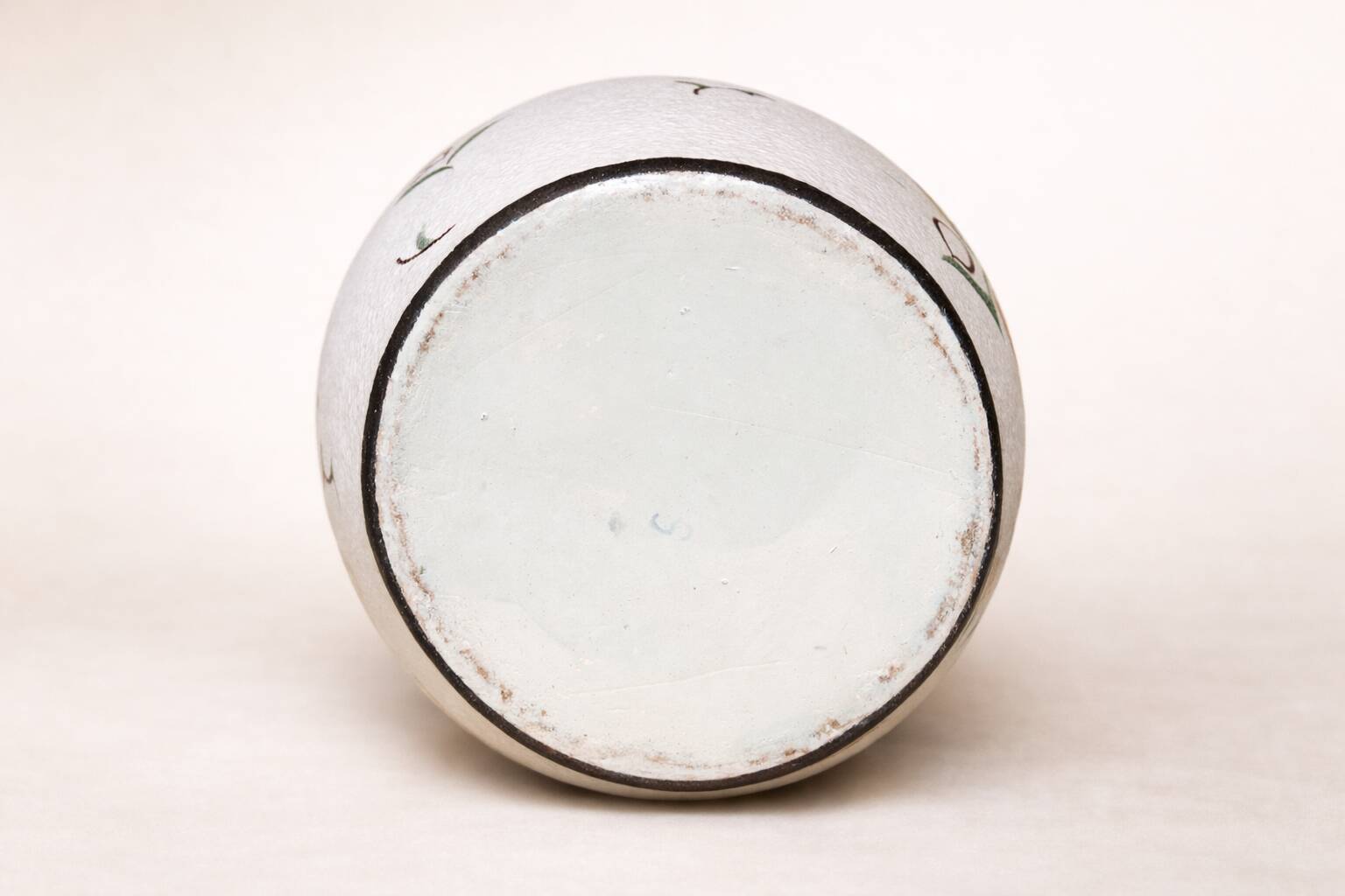 Art Deco vase by Louis Dage, frosted enamel and hand-painted floral decoration, years.