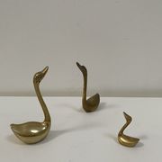 Family of brass swans of the 70s