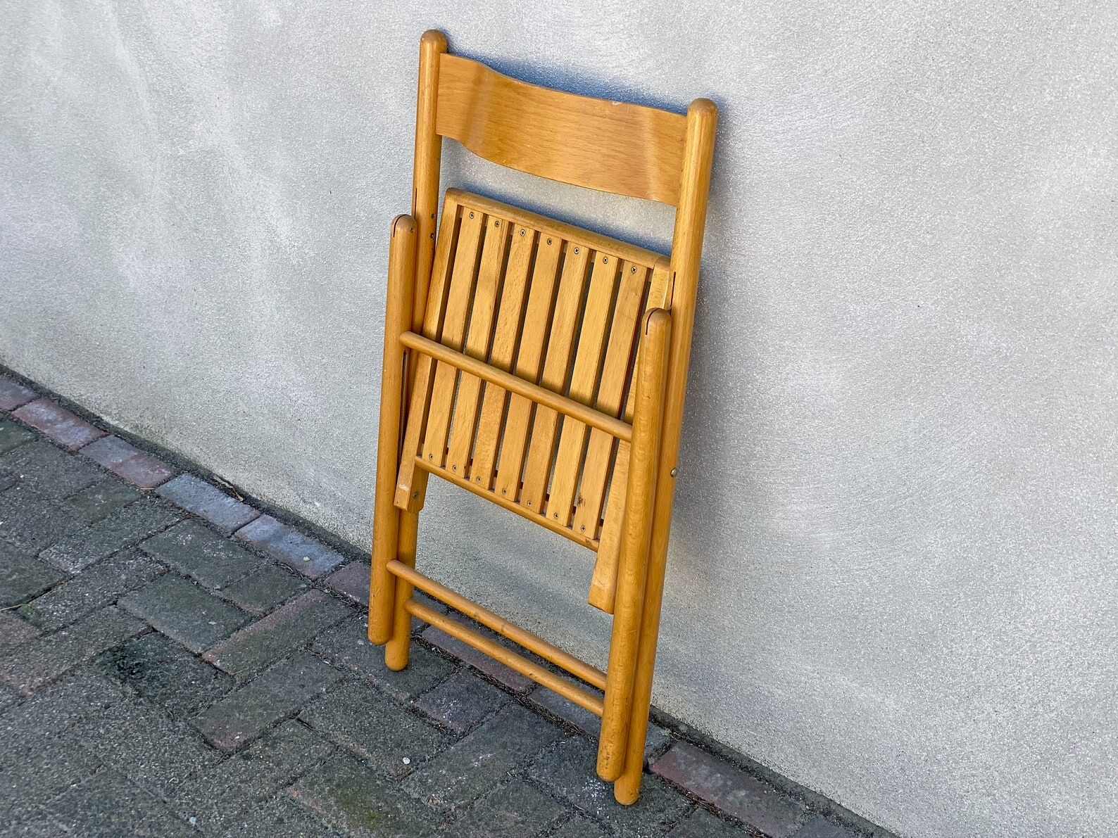 Mid Century wooden folding chair with a slat seat