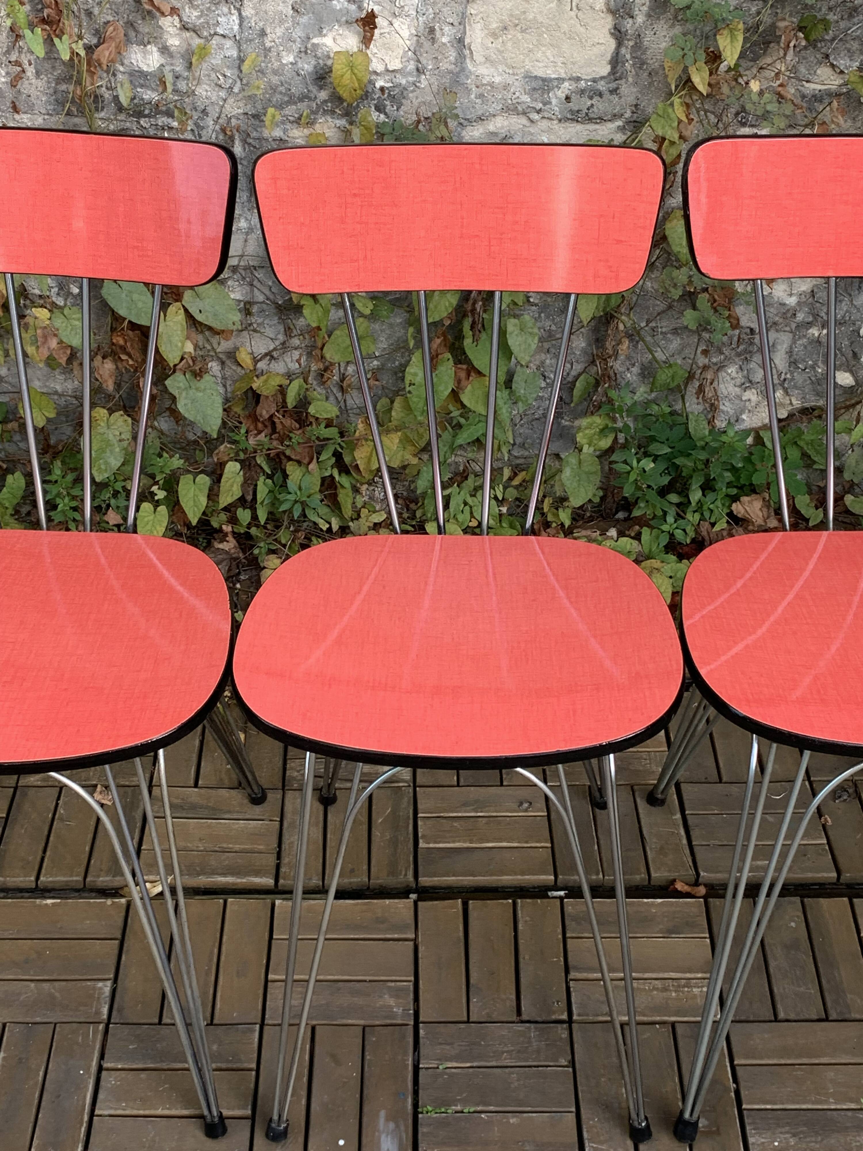 4 red Formica chairs with Eiffel legs, 1950s