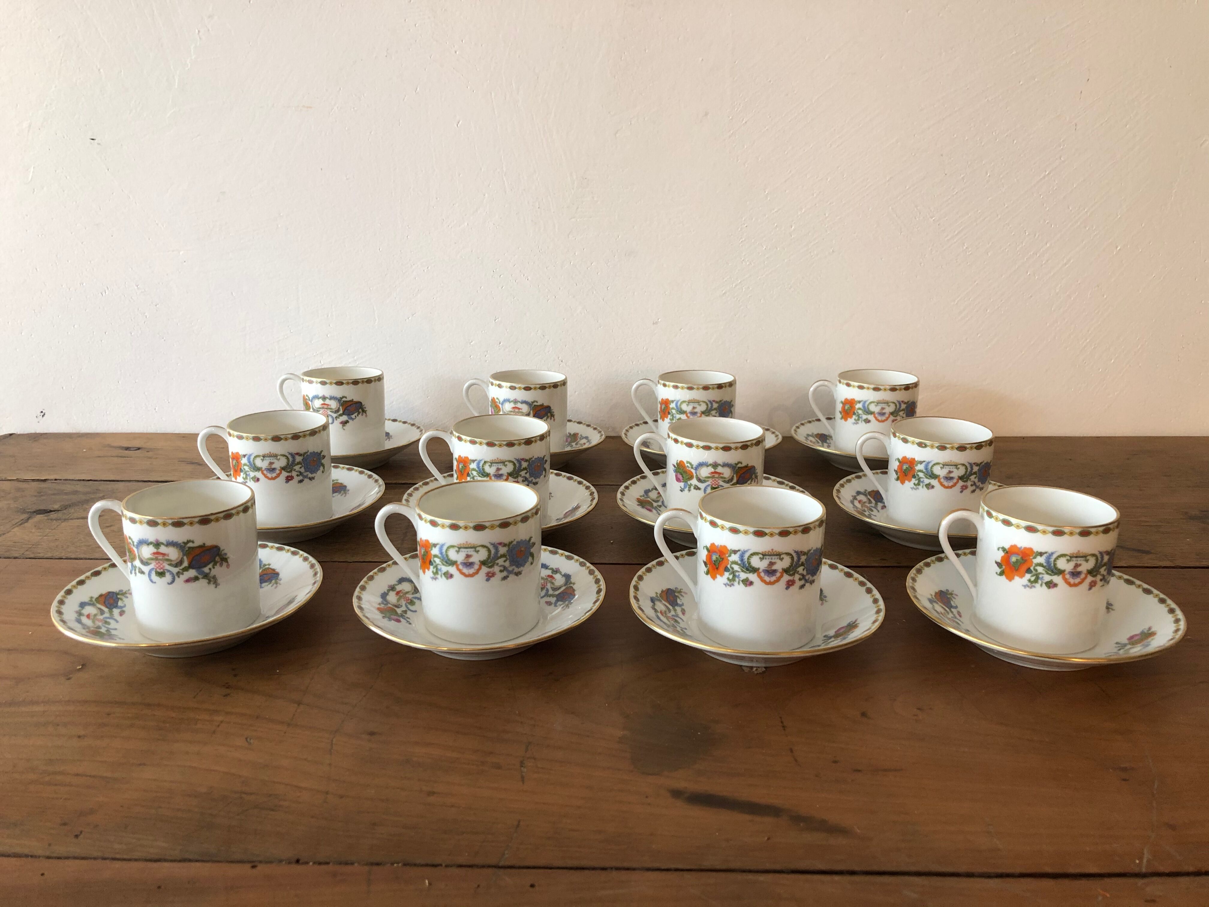 Service of 12 porcelain coffee cups, Raynaud, Limoges, 1950s.