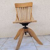 Swivel office chair in blond oak circa 1930