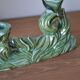 Pair of iridescent green ceramic Art Deco candlesticks