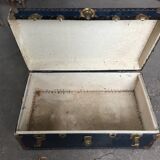 Large blue travel trunk