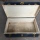 Large blue travel trunk