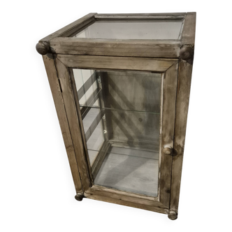 Brown weathered wooden display cabinet with 2 glass shelves.