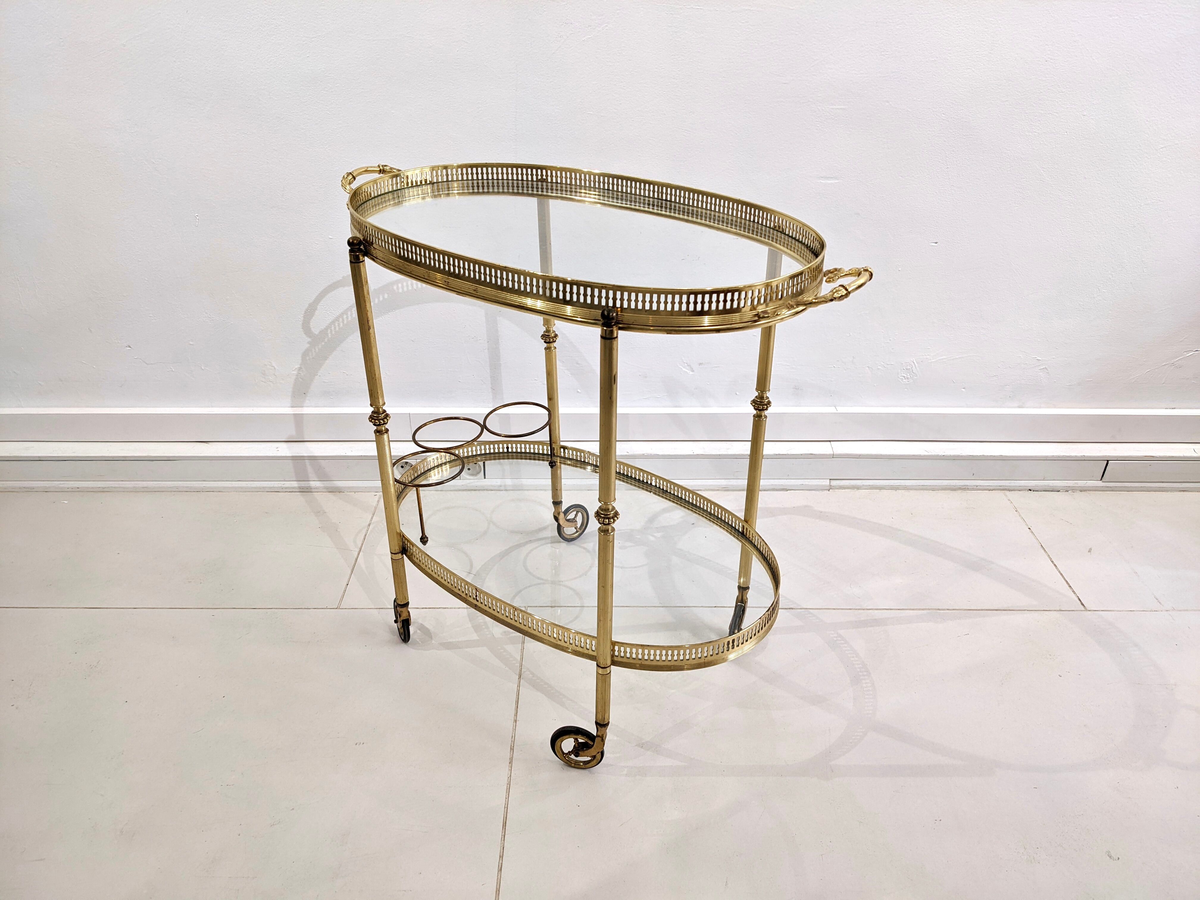 Golden metal dessert with glass tops