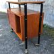 1960 wheeled furniture wood and black metal