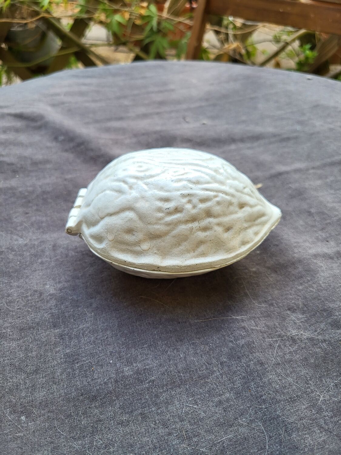 Vintage cast iron nut crate