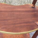 Louis XVI period pedestal table, in solid mahogany and veneer, and in gilded bronze.