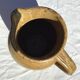 Beige handcrafted speckled sandstone pitcher