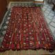 Hand woven flat woven Iraqi artisan rug.