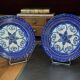 Pair of Quimper earthenware plates with pearl decoration from the 1950s.