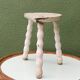Tripod stool, twisted legs