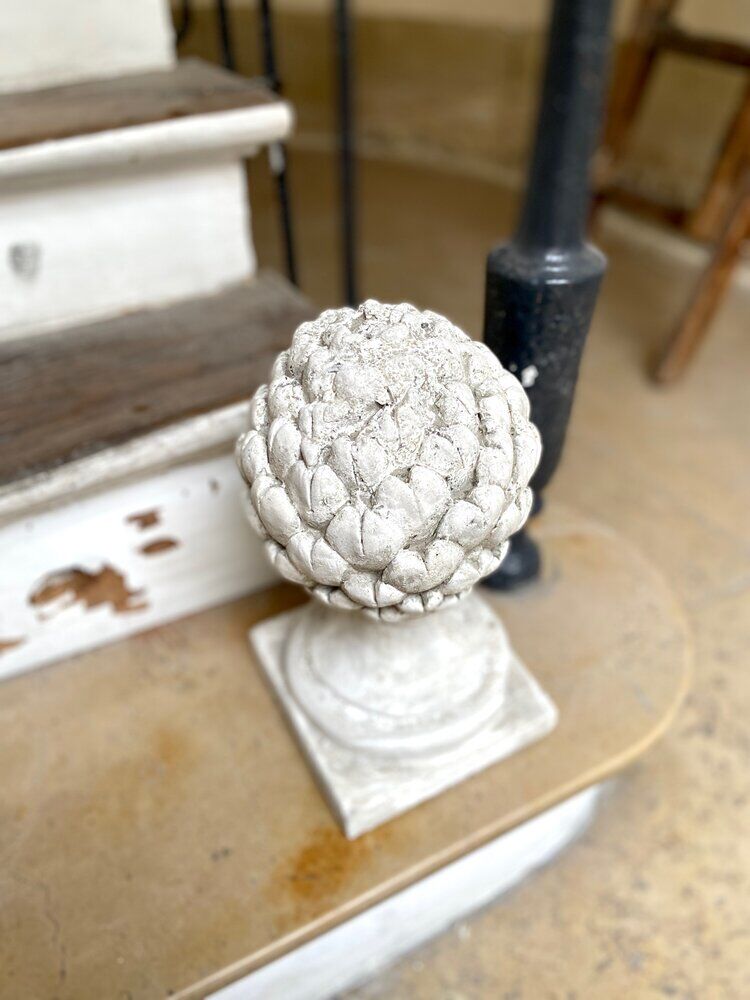 Ornamental artichoke in bleached concrete