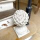 Ornamental artichoke in bleached concrete
