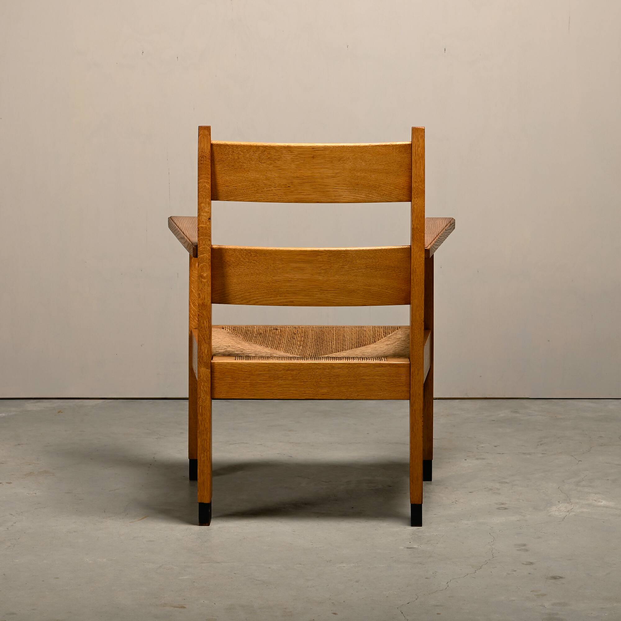 Art Deco Haagse School Armchair in solid Oak and Straw, 1930s