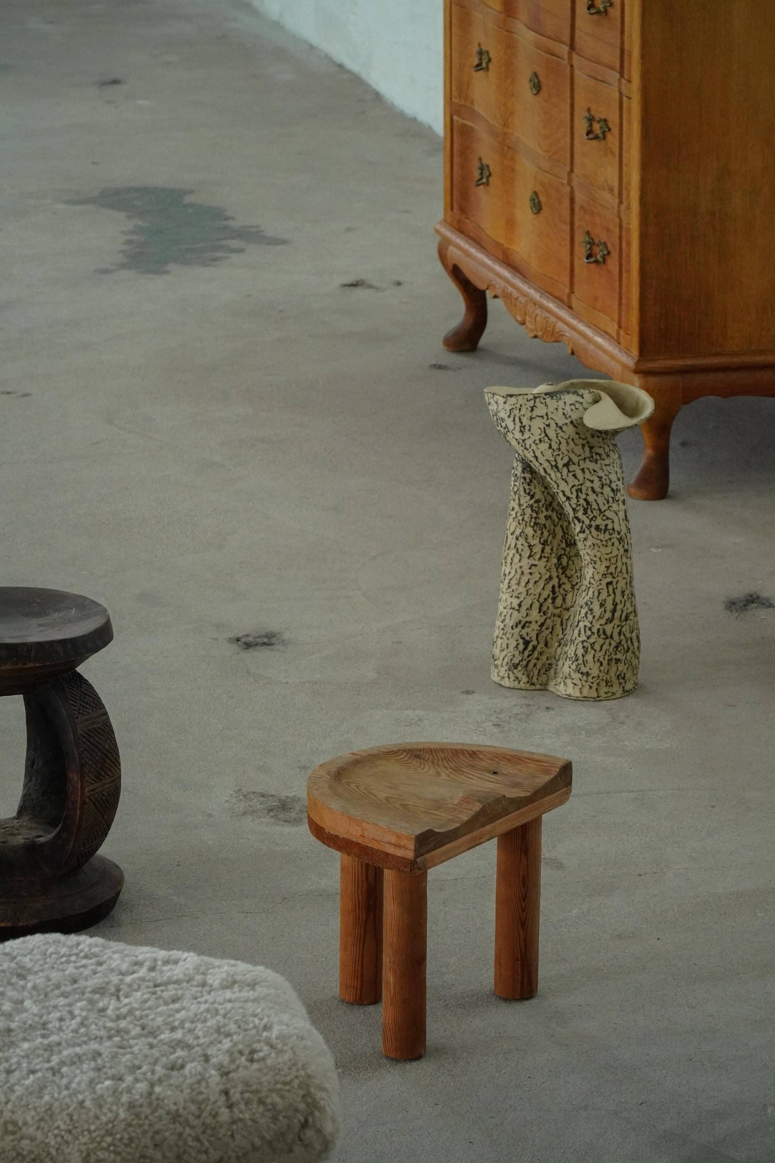 Carved pine stool, Swedish folk art, mid-20th century, 1950s.