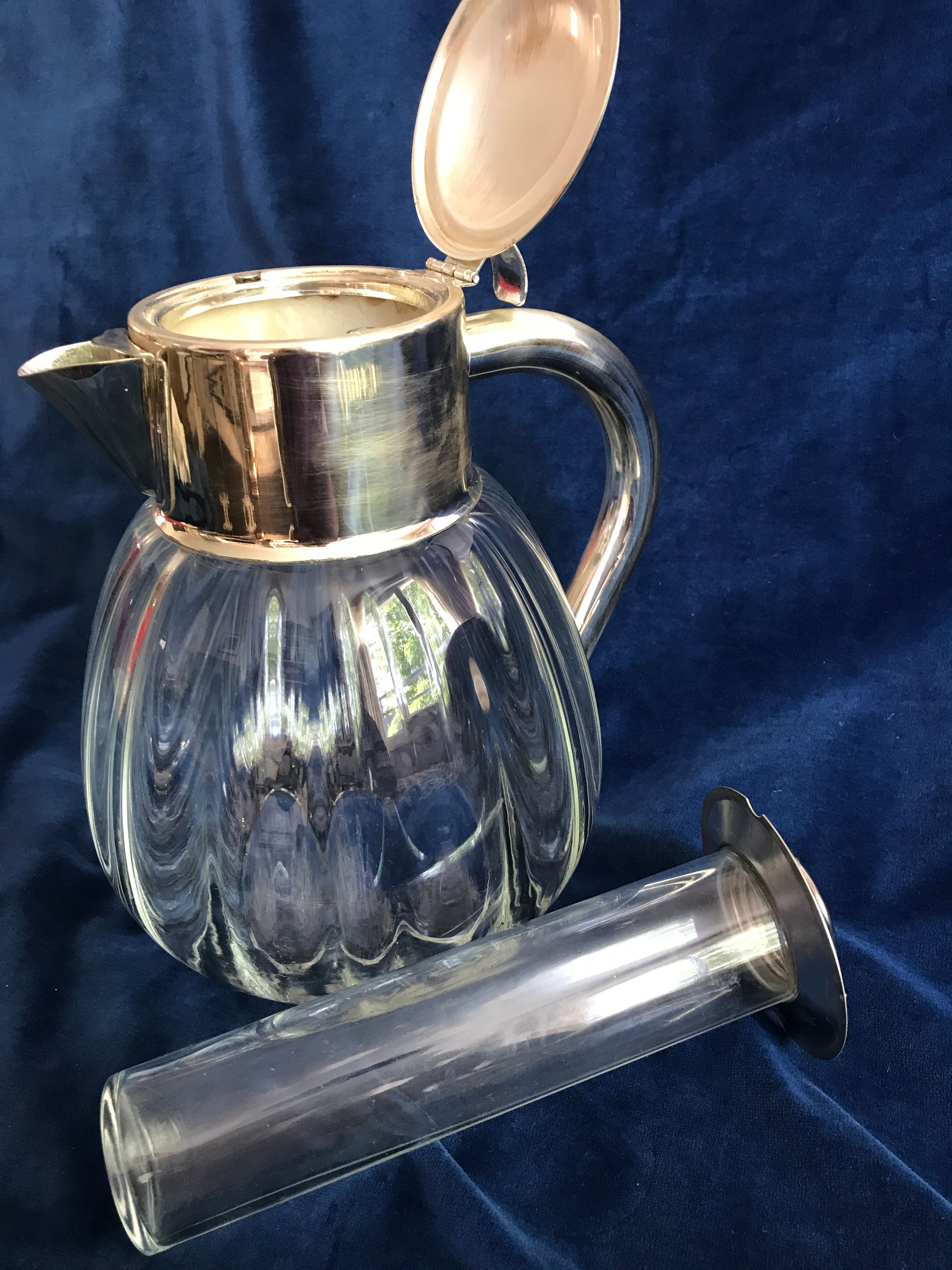 Large pitcher decanter with an ice cooler tube