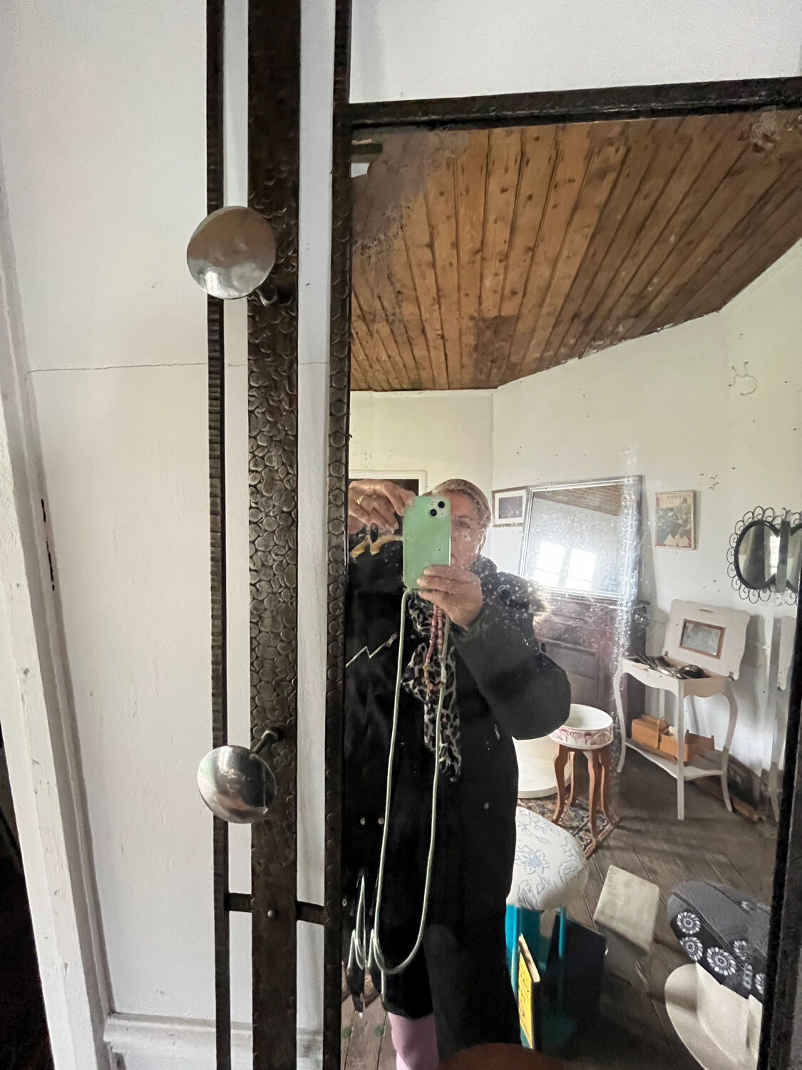 Wrought iron coat rack for the entrance