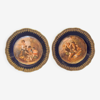 2 assiettes décorées de Limoges, T. Haviland, bleu de four, dorures, scènes d'enfants. Années 30