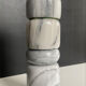 Set of 5 nesting candle holders in white marble.