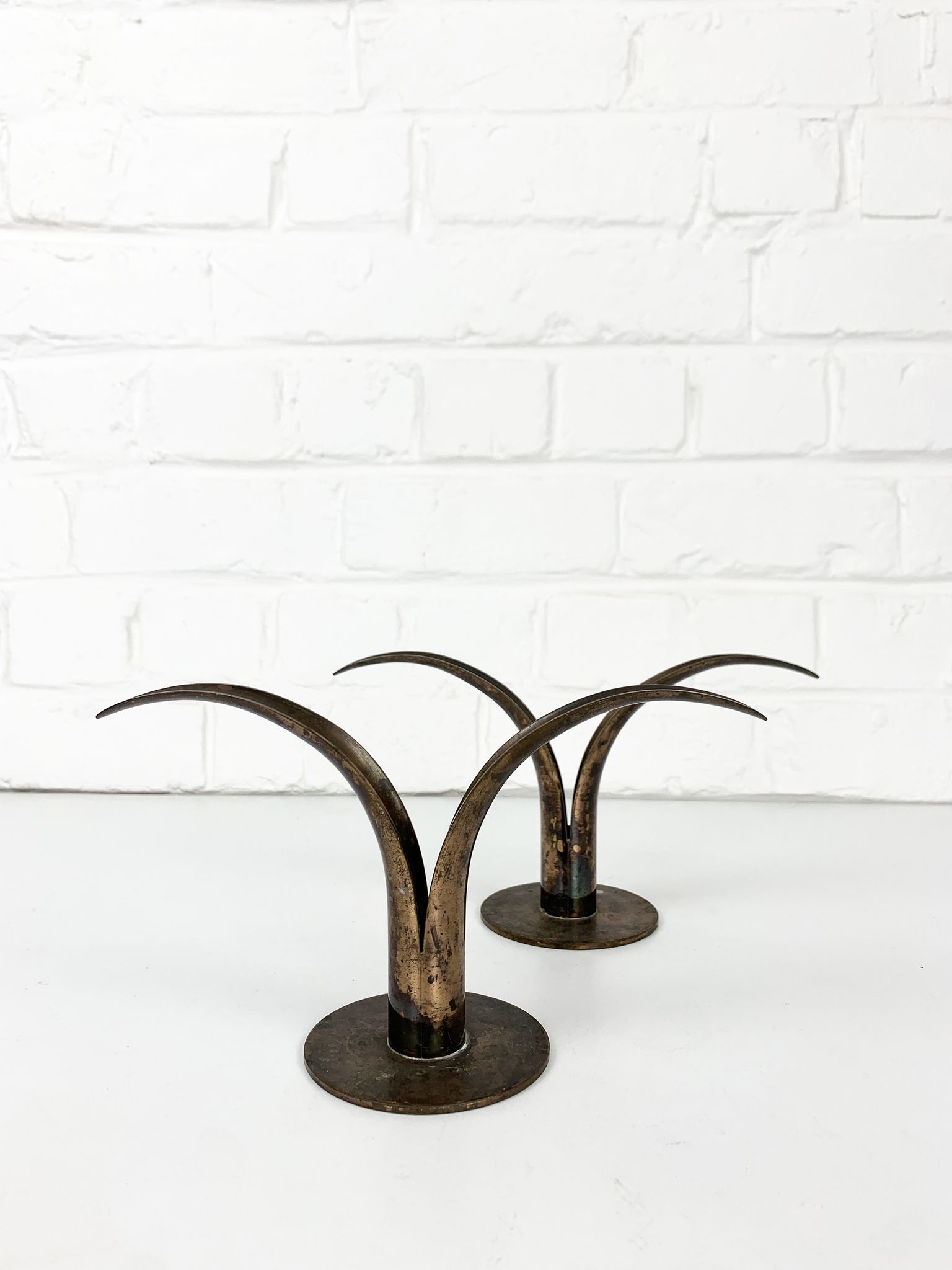 Pair of Lily brass candle holders, Ystad Metall, Sweden, design Ivar Ålenius Björk