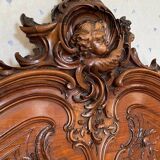 Superb Louis XV Provençal bed in richly carved and engraved walnut.