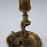 Antique bronze candlestick with dragon-shaped handle from the 17th century