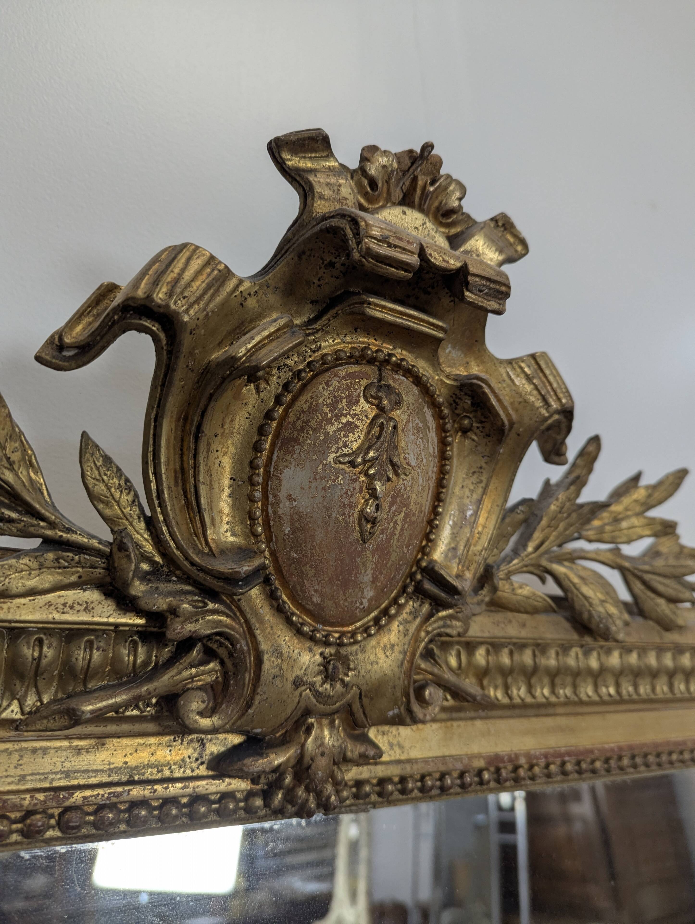 Large stucco and gilded wood mirror from the Napoléon III period.