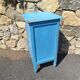 Old bedside table with 1 drawer and 1 door painted in lavender blue