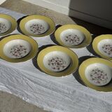 Set of 9 large vintage yellow deep plates with pink flowers and a gold rim.