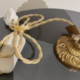 Table lamp in gold-plated brass and textured round globe