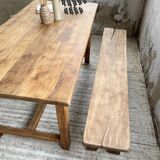 Oak farmhouse table and its two benches