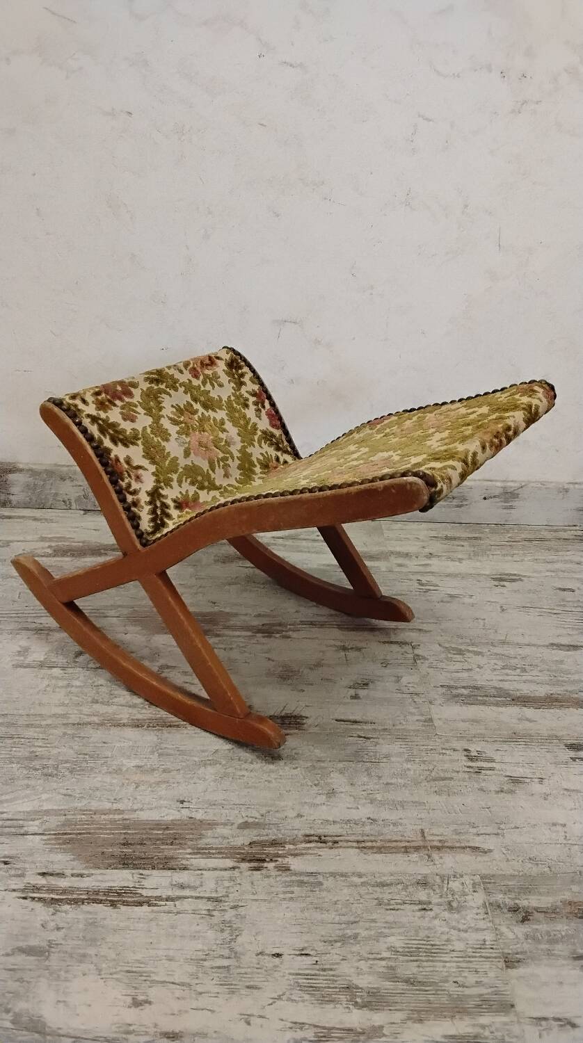 Antique rocking footrest