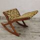 Antique rocking footrest