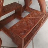 Decorative rocking elephant in carved exotic wood.