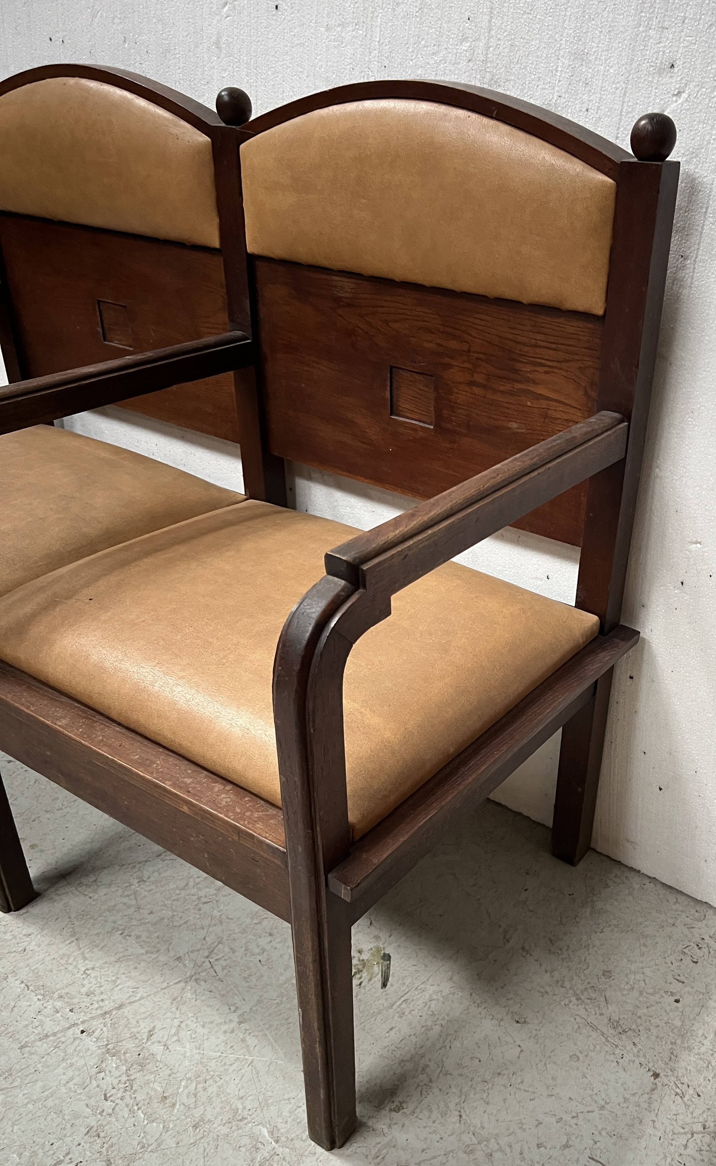 Art Deco two-seater bench in solid mahogany, 20th century.