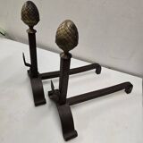 Old pair of wrought iron and bronze andirons